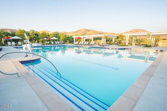 30106 Stargazer Way, Menifee, CA 92584 - community pool with a mountain view, a patio area, and a pergola