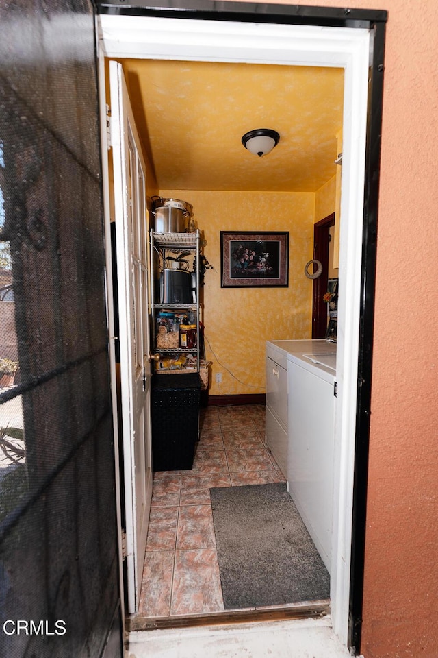 153 E Date St, Oxnard, CA 93033 - laundry area featuring washing machine and clothes dryer and baseboards