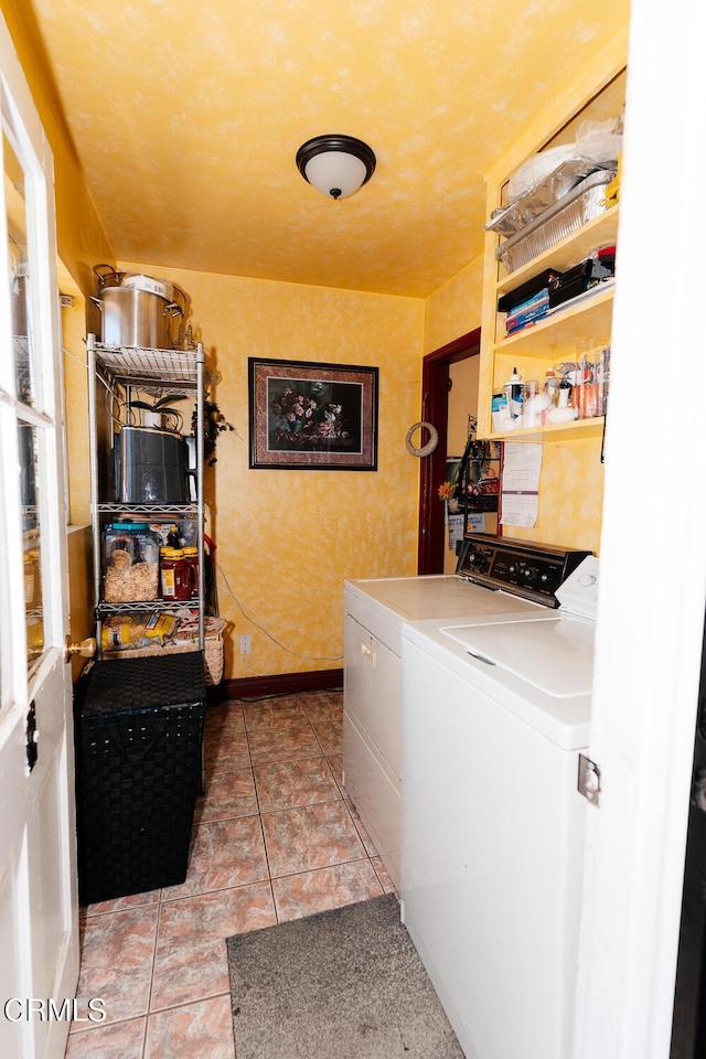 153 E Date St, Oxnard, CA 93033 - laundry room featuring independent washer and dryer, baseboards, and light tile patterned floors