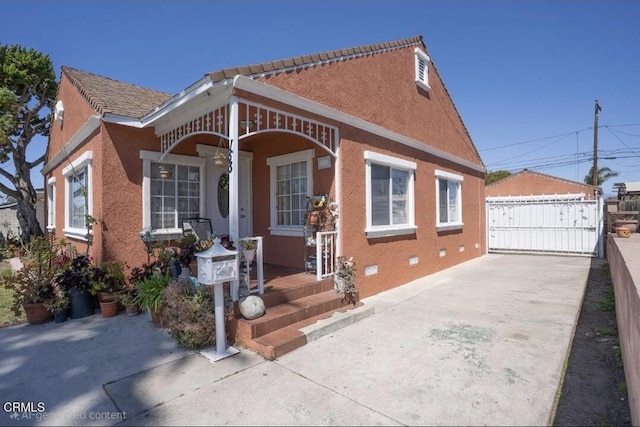 153 E Date St, Oxnard, CA 93033 - view of front of home with covered porch and stucco siding