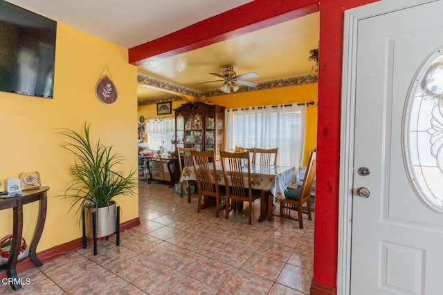 153 E Date St, Oxnard, CA 93033 - dining area with a ceiling fan, tile patterned floors, and baseboards
