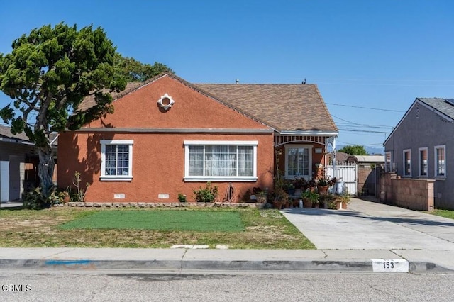 153 E Date St, Oxnard, CA 93033 - view of front of property featuring driveway and stucco siding