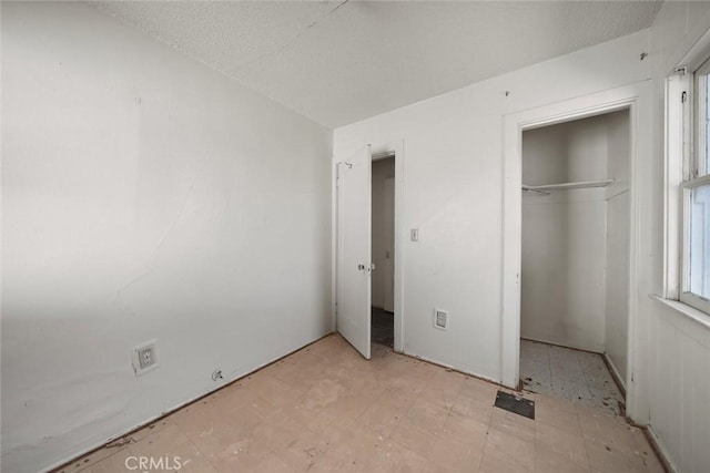 1427 Beach St, San Luis Obispo, CA 93401 - unfurnished bedroom featuring light flooring and a closet