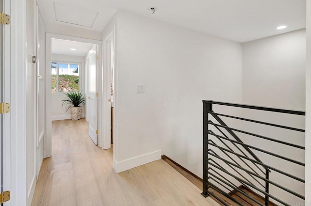 6745 Mewall Dr, San Diego, CA 92119 - corridor featuring an upstairs landing, light wood-style flooring, recessed lighting, baseboards, and attic access