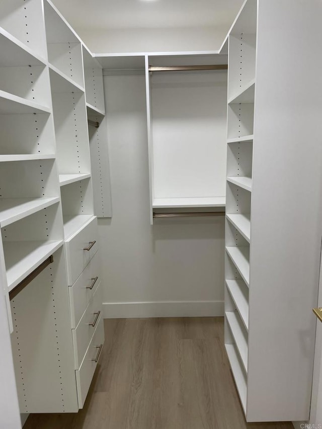 6745 Mewall Dr, San Diego, CA 92119 - walk in closet with wood finished floors
