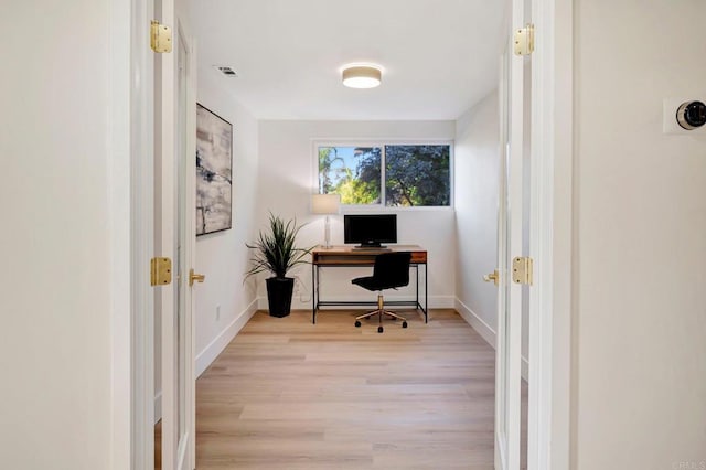 6745 Mewall Dr, San Diego, CA 92119 - home office featuring light wood-style flooring and baseboards