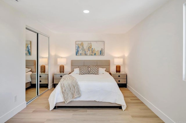 6745 Mewall Dr, San Diego, CA 92119 - bedroom featuring baseboards, a closet, light wood finished floors, and recessed lighting
