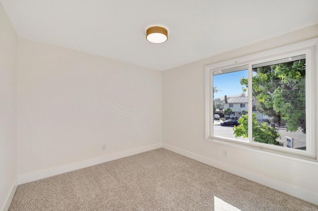 6745 Mewall Dr, San Diego, CA 92119 - carpeted empty room with baseboards