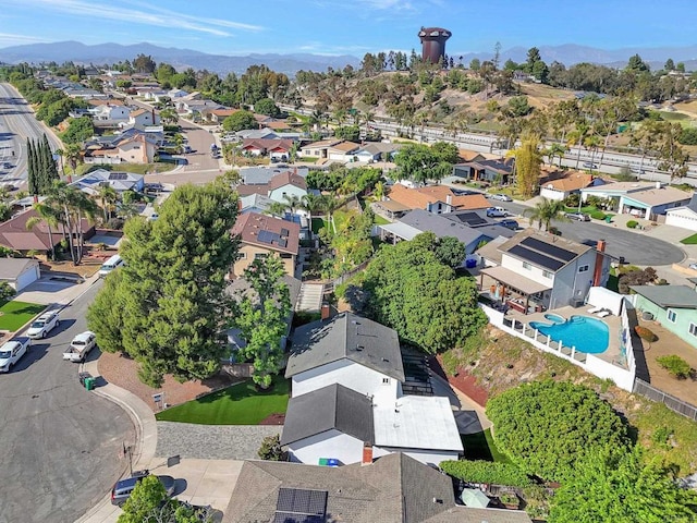 6745 Mewall Dr, San Diego, CA 92119 - aerial view of residential area with a pool and a mountainous background