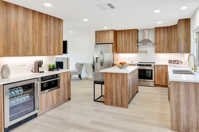 6745 Mewall Dr, San Diego, CA 92119 - kitchen with wall chimney exhaust hood, stainless steel appliances, wine cooler, modern cabinets, and recessed lighting