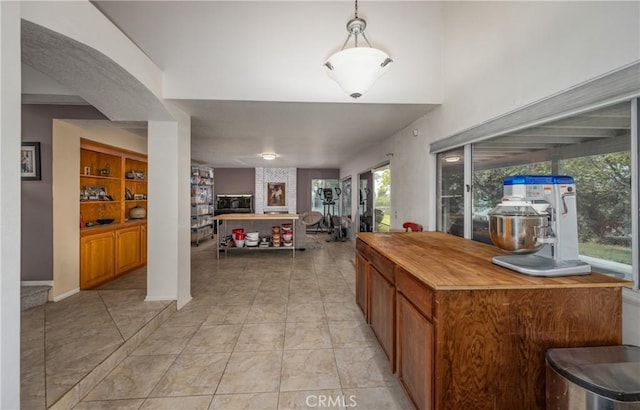 9979 Timbermist Ct, Rancho Cucamonga, CA 91737 - bar with hanging light fixtures and light tile patterned floors