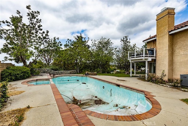 9979 Timbermist Ct, Rancho Cucamonga, CA 91737 - view of pool with a patio area, an empty pool, and central air condition unit