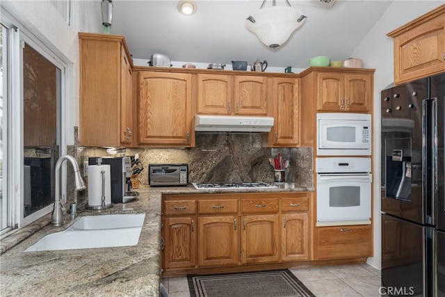 9979 Timbermist Ct, Rancho Cucamonga, CA 91737 - kitchen with white appliances, a sink, under cabinet range hood, and decorative backsplash