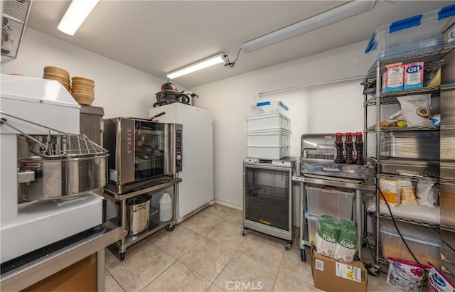 9979 Timbermist Ct, Rancho Cucamonga, CA 91737 - kitchen with freestanding refrigerator and light tile patterned floors