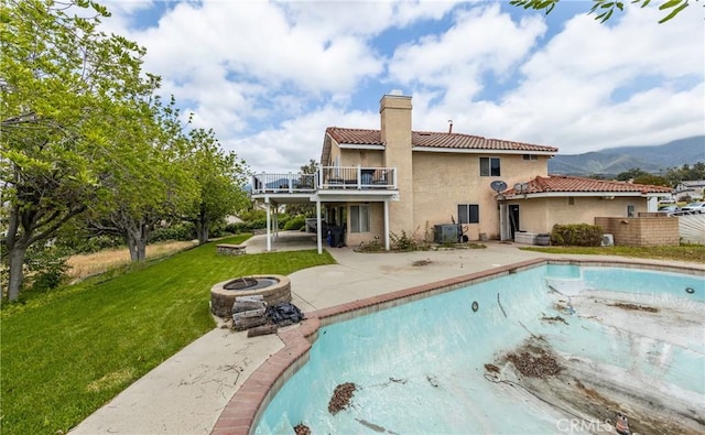 9979 Timbermist Ct, Rancho Cucamonga, CA 91737 - view of pool featuring a fire pit, a patio area, a yard, and an empty pool