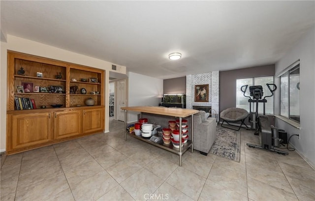 9979 Timbermist Ct, Rancho Cucamonga, CA 91737 - kitchen with open shelves, a fireplace, light tile patterned floors, open floor plan, and baseboards