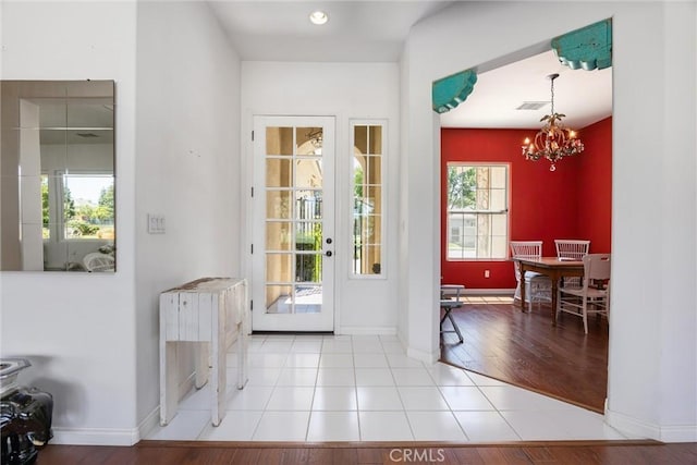2403 Crocus Dr, Bakersfield, CA 93311 - doorway featuring a chandelier and baseboards