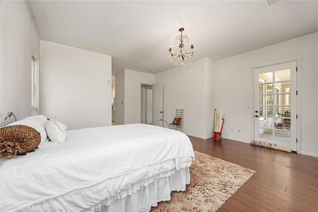 2403 Crocus Dr, Bakersfield, CA 93311 - bedroom with a chandelier, wood finished floors, and baseboards