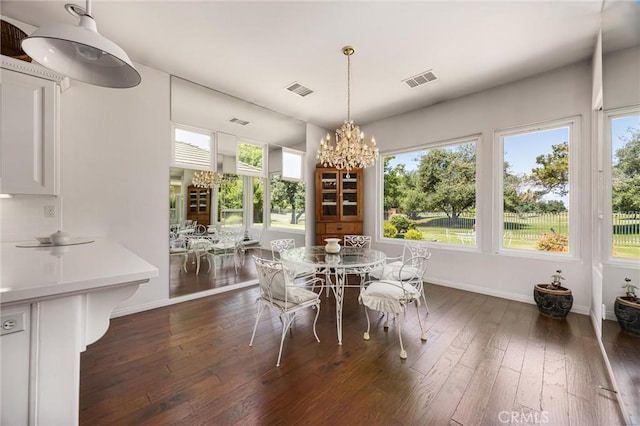 2403 Crocus Dr, Bakersfield, CA 93311 - dining room with a chandelier, baseboards, and dark wood-style flooring