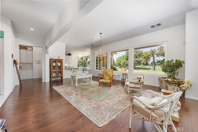2403 Crocus Dr, Bakersfield, CA 93311 - living room featuring dark wood finished floors, a chandelier, baseboards, and recessed lighting