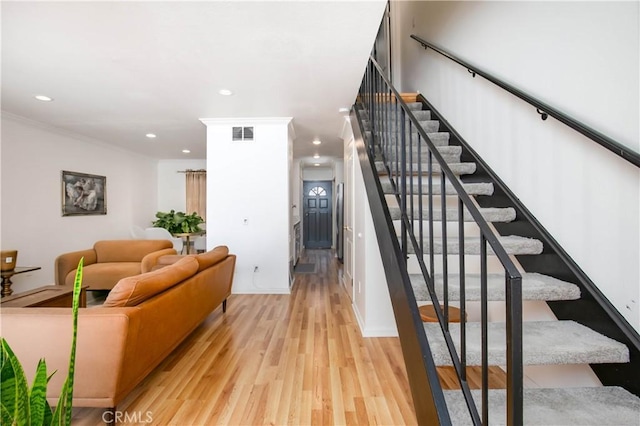 28729 Conejo View Dr, Agoura Hills, CA 91301 - stairs featuring recessed lighting, wood finished floors, crown molding, and baseboards