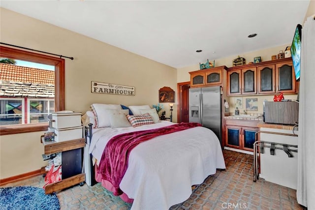 1532 Kensing Ln, North Tustin, CA 92705 - bedroom with stainless steel fridge with ice dispenser and light tile patterned floors