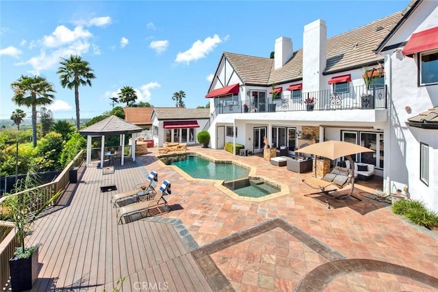 1532 Kensing Ln, North Tustin, CA 92705 - view of pool featuring a gazebo, a patio area, a pool with connected hot tub, an outdoor living space, and outdoor dining space