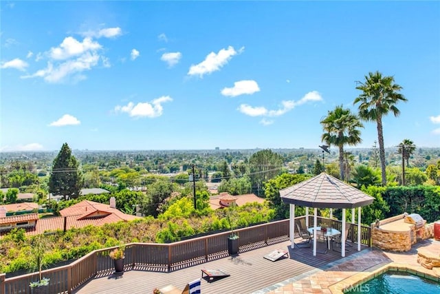 1532 Kensing Ln, North Tustin, CA 92705 - view of pool with a gazebo, a wooden deck, outdoor dining area, and view of scattered trees