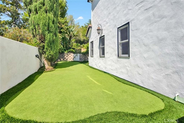 1532 Kensing Ln, North Tustin, CA 92705 - fenced backyard with a putting area