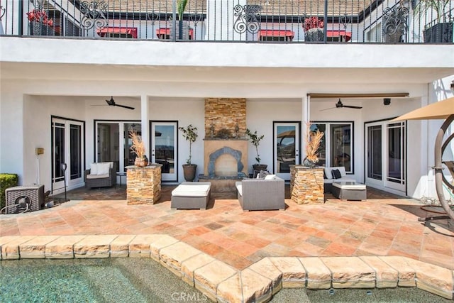 1532 Kensing Ln, North Tustin, CA 92705 - back of house featuring a balcony, a ceiling fan, a patio, and stucco siding