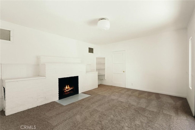 2319 S Corning St, Los Angeles, CA 90034 - unfurnished living room with carpet floors and a fireplace