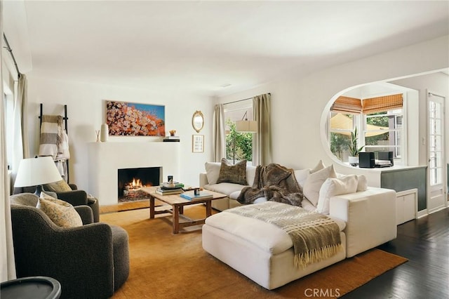2319 S Corning St, Los Angeles, CA 90034 - living area with a lit fireplace and wood finished floors