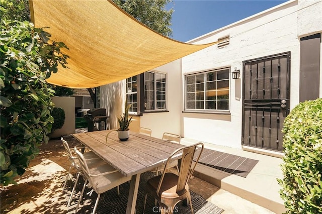 2319 S Corning St, Los Angeles, CA 90034 - view of patio with a grill and outdoor dining space