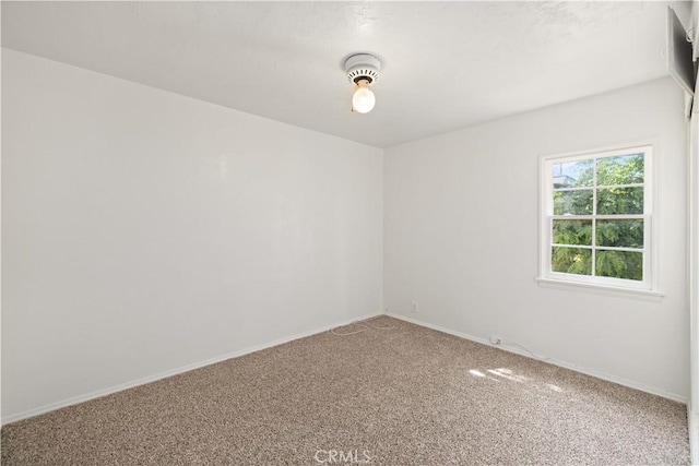45110 Elm Ave, Lancaster, CA 93534 - carpeted spare room featuring baseboards