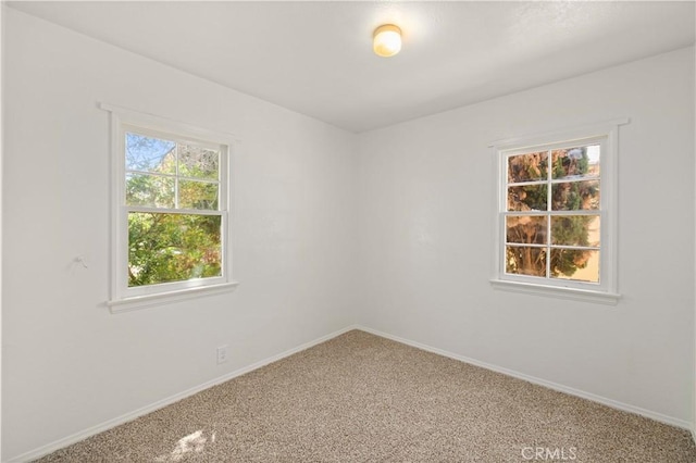 45110 Elm Ave, Lancaster, CA 93534 - spare room featuring carpet flooring and baseboards