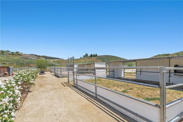 36475 Avenida La Cresta, Murrieta, CA 92562 - view of yard featuring an exterior structure, an outbuilding, and a rural view