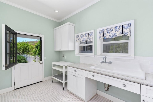 36475 Avenida La Cresta, Murrieta, CA 92562 - washroom with ornamental molding, baseboards, cabinet space, hookup for an electric dryer, and recessed lighting
