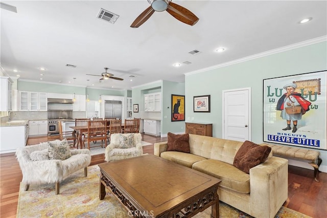 36475 Avenida La Cresta, Murrieta, CA 92562 - living area featuring ceiling fan, crown molding, recessed lighting, and light wood-style floors