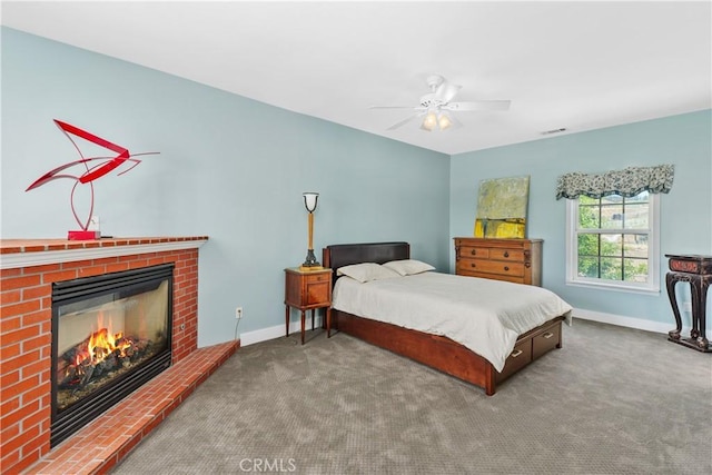 36475 Avenida La Cresta, Murrieta, CA 92562 - bedroom with baseboards, carpet, a brick fireplace, and a ceiling fan
