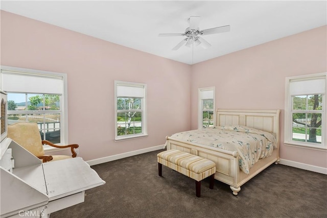 36475 Avenida La Cresta, Murrieta, CA 92562 - bedroom with multiple windows, baseboards, and dark colored carpet