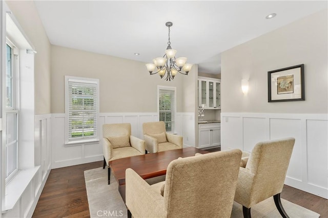 36475 Avenida La Cresta, Murrieta, CA 92562 - dining area featuring a decorative wall, a chandelier, a wainscoted wall, and dark wood finished floors