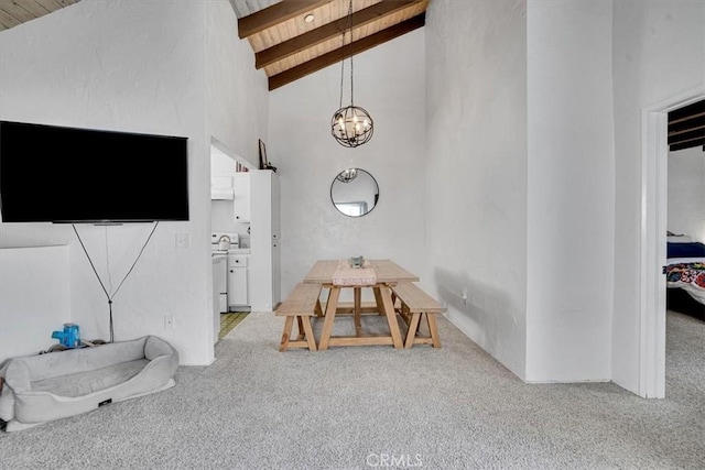 2212 Grant Ave, Redondo Beach, CA 90278 - dining room featuring light colored carpet, a chandelier, wood ceiling with exposed beams, and high vaulted ceiling