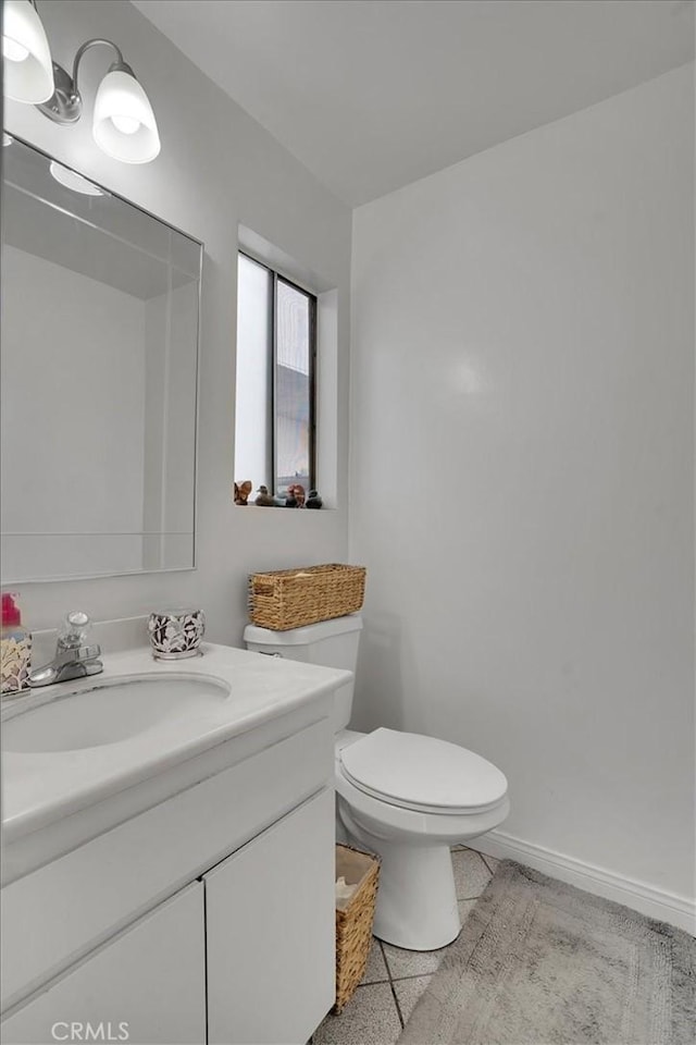 2212 Grant Ave, Redondo Beach, CA 90278 - bathroom with vanity, toilet, and baseboards