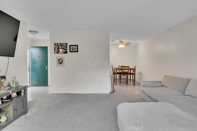 2212 Grant Ave, Redondo Beach, CA 90278 - living area with a ceiling fan, light colored carpet, and light tile patterned floors