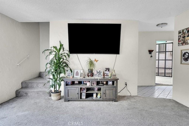 2212 Grant Ave, Redondo Beach, CA 90278 - living area featuring carpet floors, a textured ceiling, and tile patterned flooring