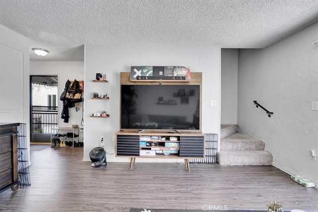 2212 Grant Ave, Redondo Beach, CA 90278 - living area featuring a textured ceiling, wood finished floors, and stairway