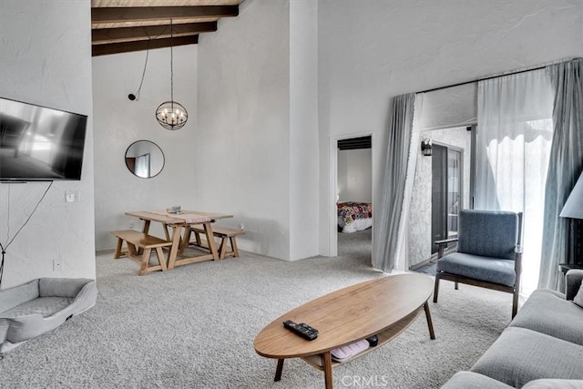2212 Grant Ave, Redondo Beach, CA 90278 - carpeted living area with beamed ceiling, a high ceiling, and a chandelier