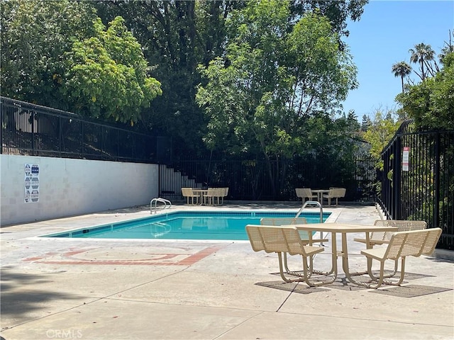 399 N Ironpike Cir Unit 18, Anaheim, CA 92807 - community pool with a patio area