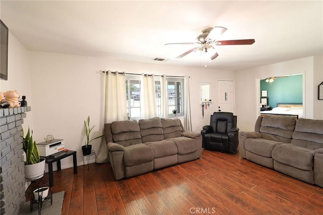 18353 Hackberry St, Hesperia, CA 92345 - living room with ceiling fan, dark wood finished floors, and baseboards