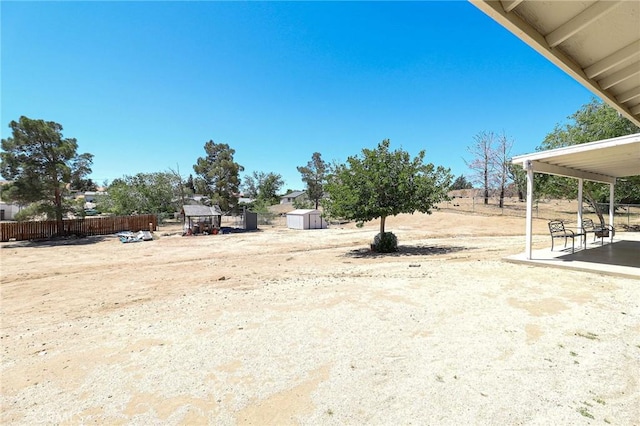 18353 Hackberry St, Hesperia, CA 92345 - view of yard featuring a patio area